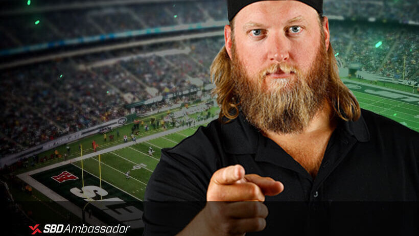 Nick Mangold in front of football field