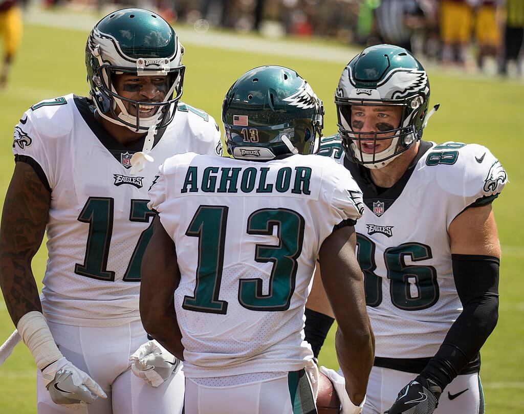 Three Philadelphia Eagles celebrating