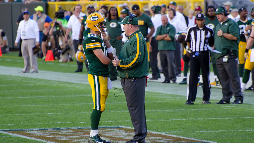 Aaron Rodgers and Mike McCarthy Green Bay Packers discussing a play