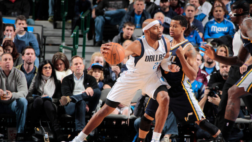 Vince Carter pounds the ball into the paint.