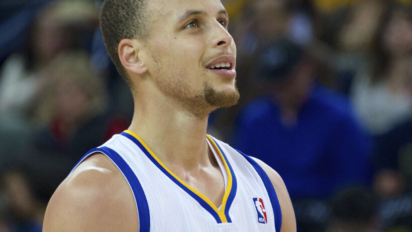 Steph Curry looking at the scoreboard