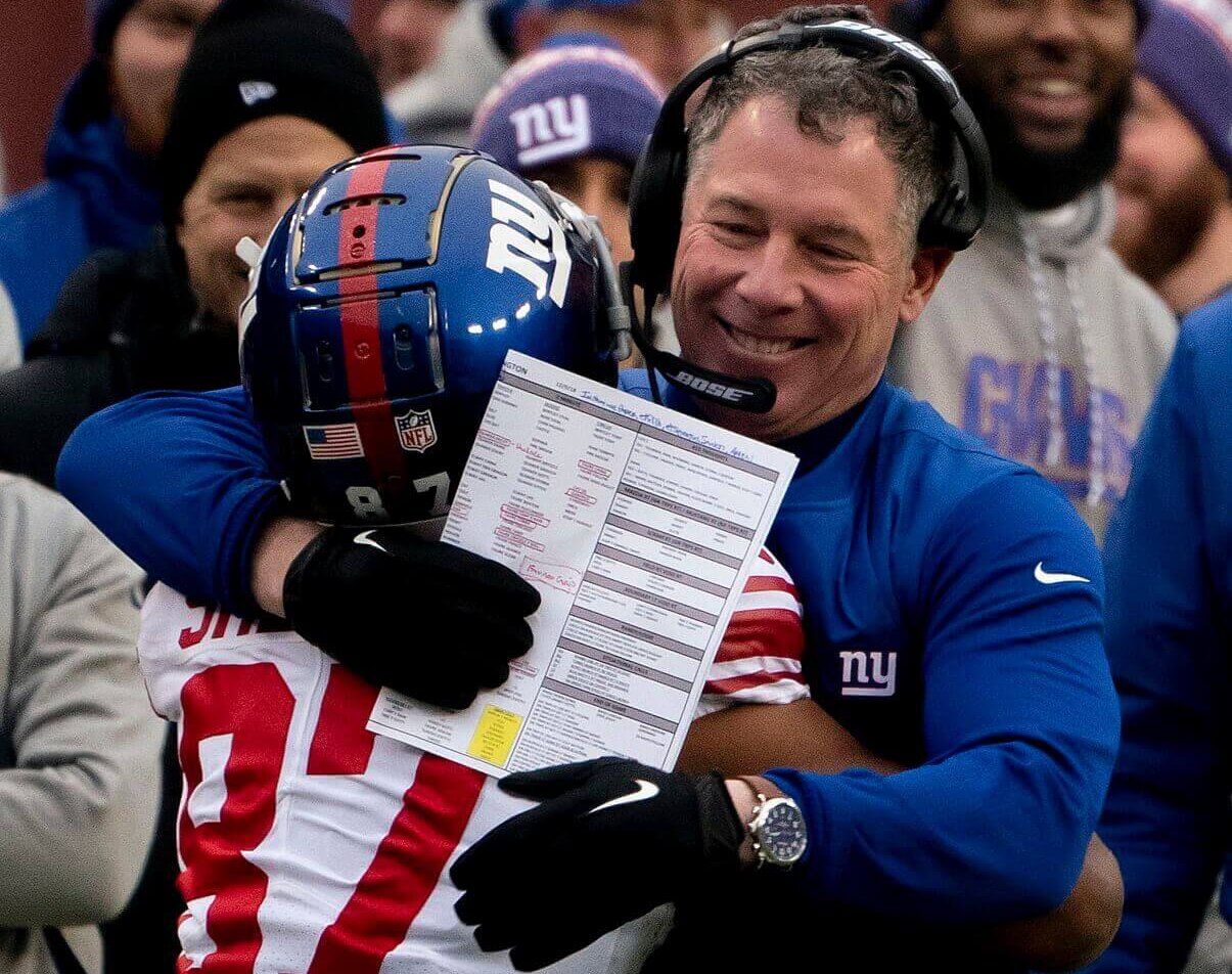 Sterling Shepard hugging Pat Shurmur