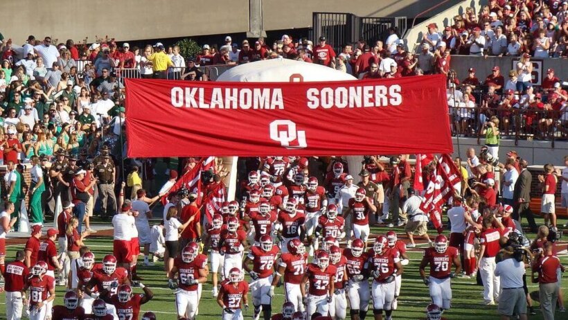 Oklahoma Sooners taking the field