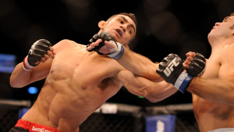 24 SEPTEMBER 2011: Tony Ferguson exchanges blows with Aaron Riley during UFC 135 at the Pepsi Center in Denver, Colorado.