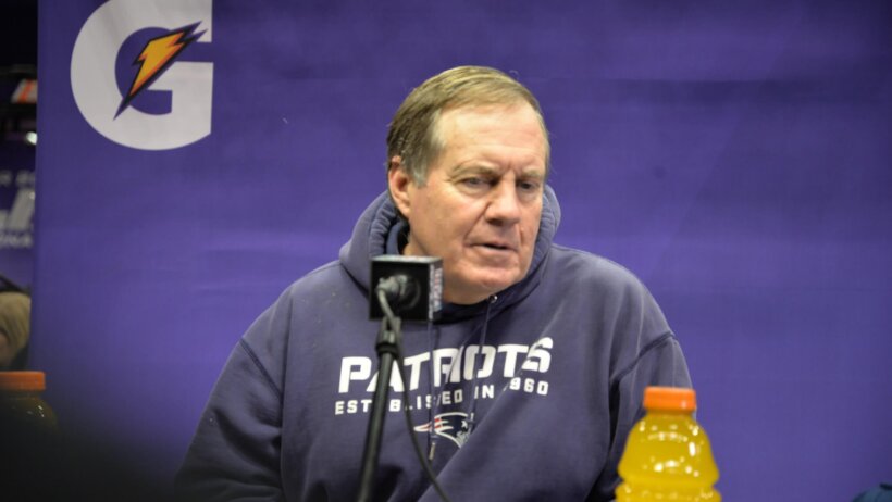 Head coach of the New England Patriots Bill Belichick answering questions at the podium