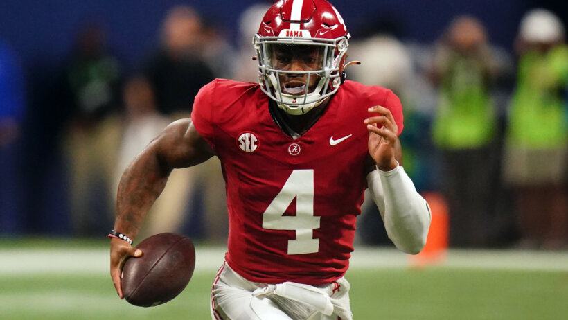 Alabama Crimson Tide quarterback Jalen Milroe runs against the Georgia Bulldogs