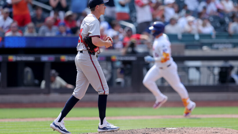 New York Mets first baseman Pete Alonso rounding the bases after hitting a home run against Atlanta Braves relief pitcher Jimmy Herget