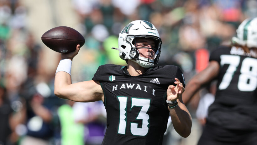 Hawaii Rainbow Warriors quarterback Brayden Schager makes a pass