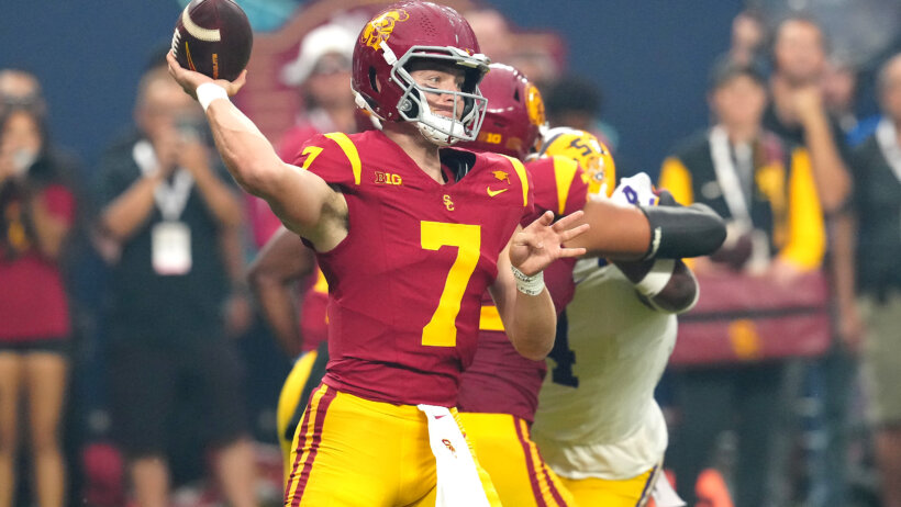 USC Trojans quarterback Miller Moss throws a pass