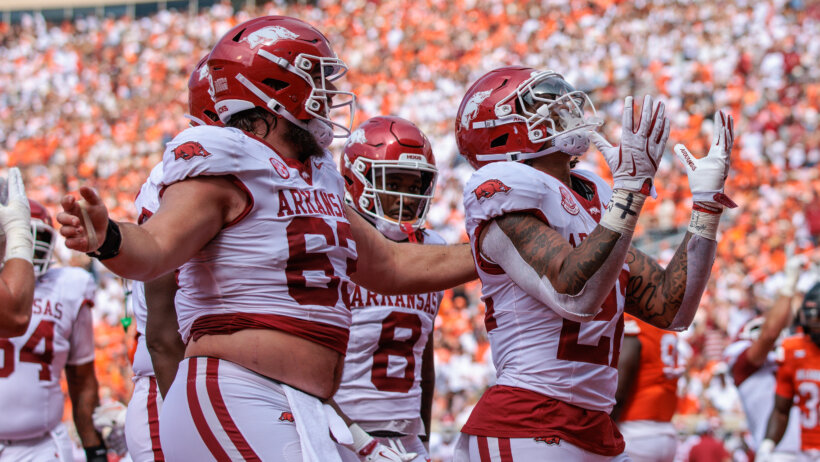 Arkansas Razorbacks running back JaQuinden Jackson celebrates in the end zone