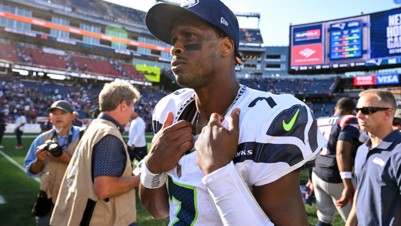 Geno Smith on the field after a game