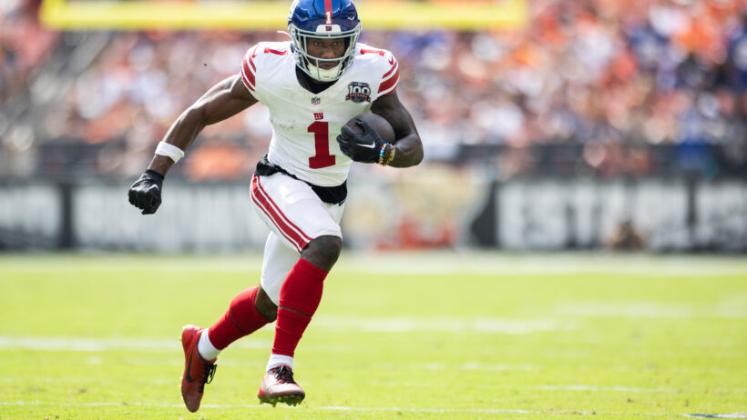 New York Giants wide receiver Malik Nabers running with the ball