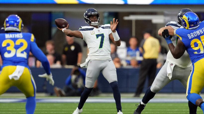 Seattle Seahawks quarterback Geno Smith throwing a pass against the Los Angeles Rams