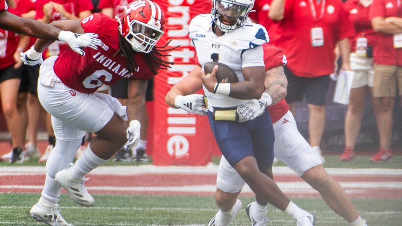 Keyone Jenkins tries to avoid the Indiana pass rush.