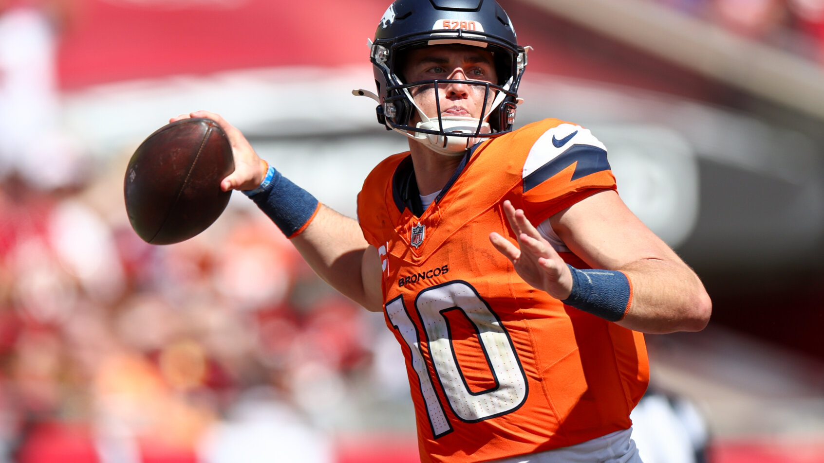 Denver Broncos quarterback Bo Nix drops back to pass