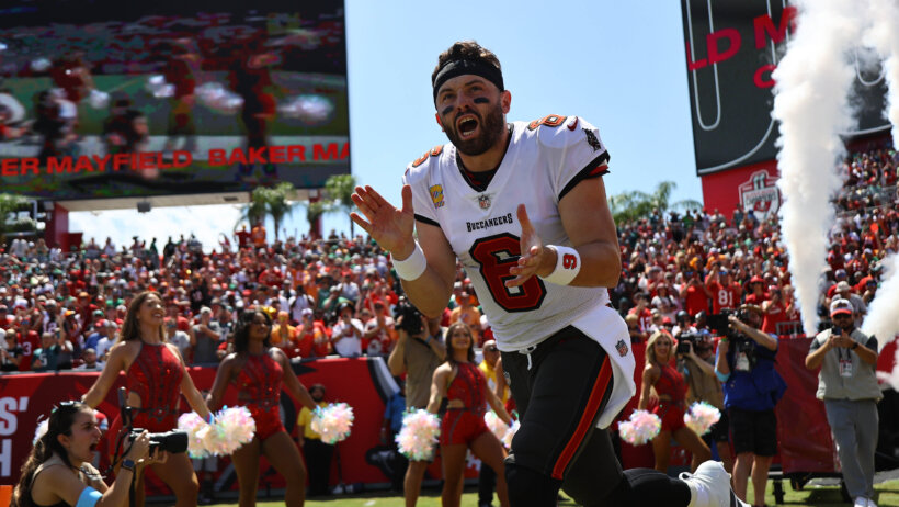 Baker Mayfield runs out of the tunnel.
