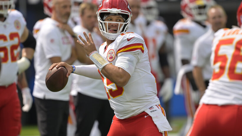 Kansas City Chiefs quarterback Patrick Mahomes gets ready to throw a pass