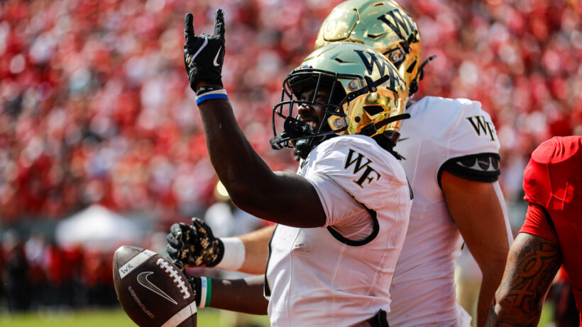 Wake Forest Demon Deacons running back Demond Claiborne celebrates a touchdown