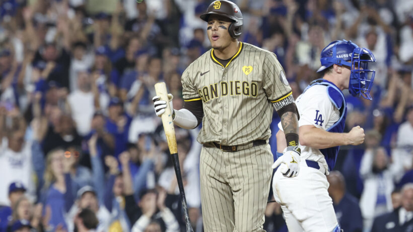 San Diego Padres third baseman Manny Machado walks to the dugout after striking out