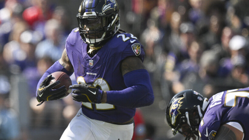 Baltimore Ravens running back Derrick Henry runs with the ball