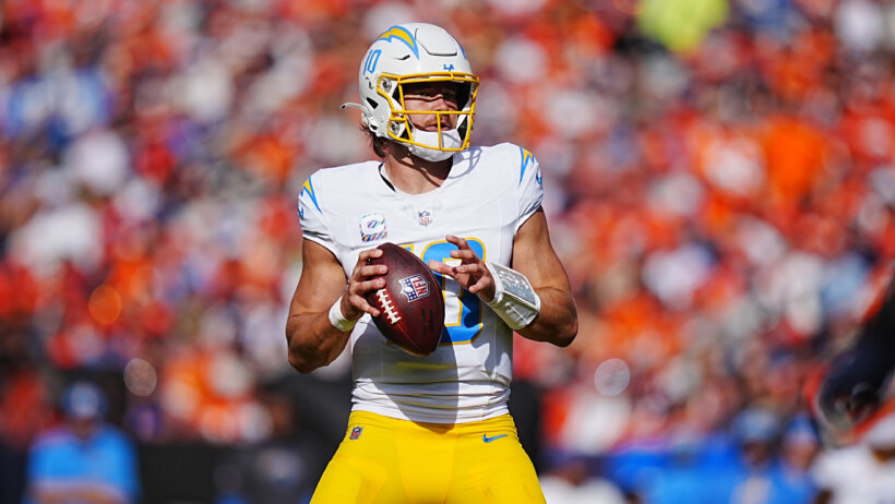 Los Angeles Chargers quarterback Justin Herbert holding the ball in the pocket