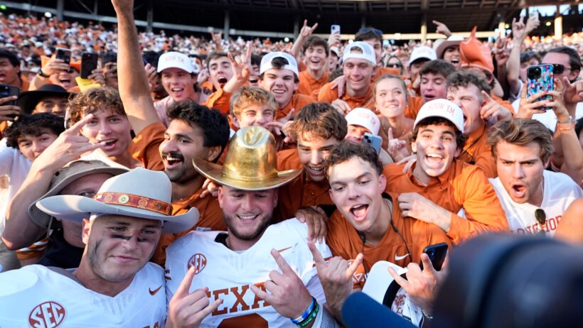 Quinn Ewers and his teammates celebrate a win over Oklahoma.