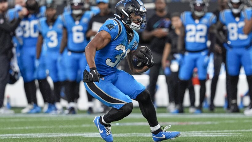 Chuba Hubbard running with the football