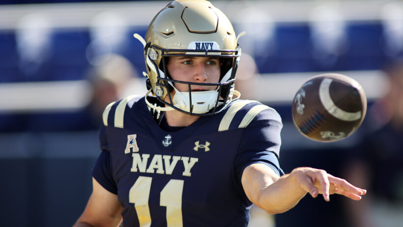 Navy Midshipmen quarterback Blake Horvath pitches the ball