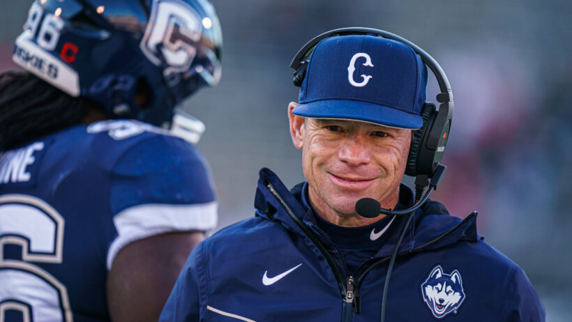 UConn Huskies head coach Jim Mora watches from the sideline