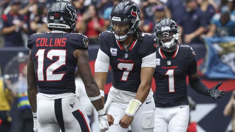 CJ Stroud and Nico Collins celebrate a touchdown.