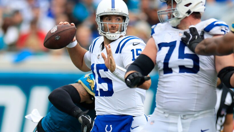 Indianapolis Colts quarterback Joe Flacco throwing a pass