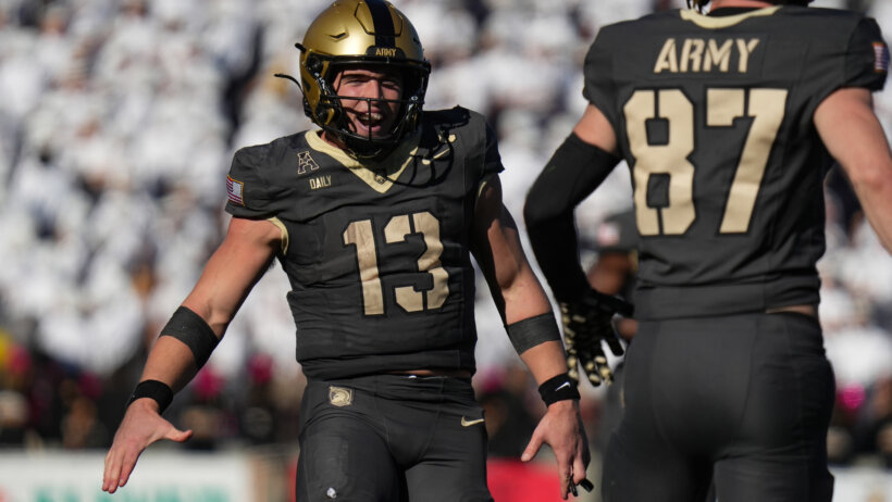 Army Black Knights quarterback Bryson Daily reacts to a catch