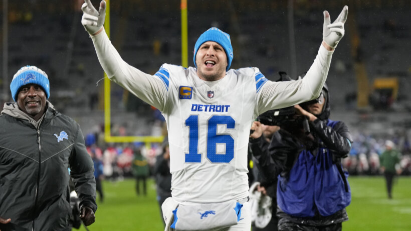Detroit Lions quarterback Jared Goff celebrates as he runs off the field