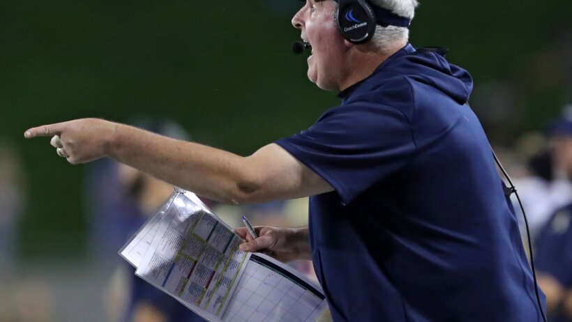 Akron Zips football coach Joe Moorhead reacts to a play during the second half of an NCAA college football game