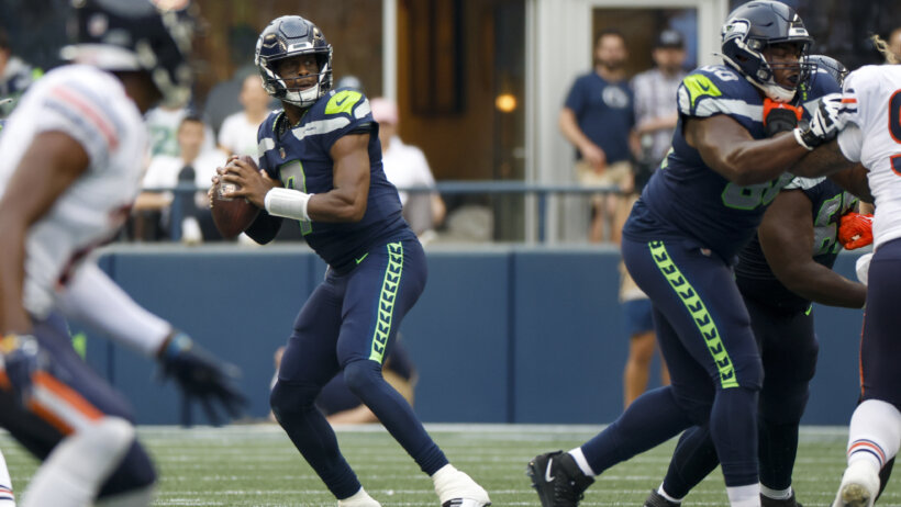Seattle Seahawks quarterback Geno Smith standing in the pocket against the Chicago Bears