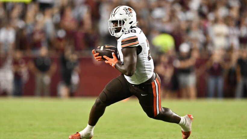 Jaison Patterson running with football