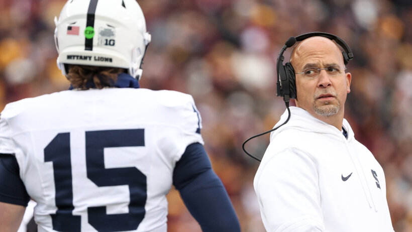 Penn State Nittany Lions head coach James Franklin looks at quarterback Drew Allar