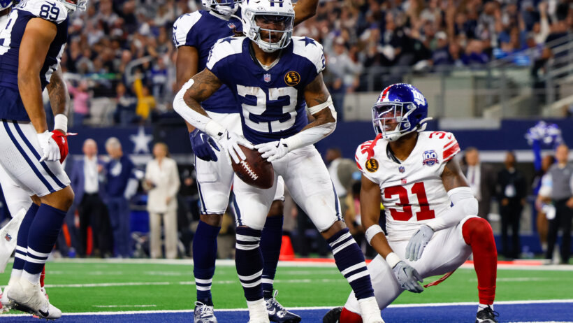 Rico Dowdle scoring a touchdown