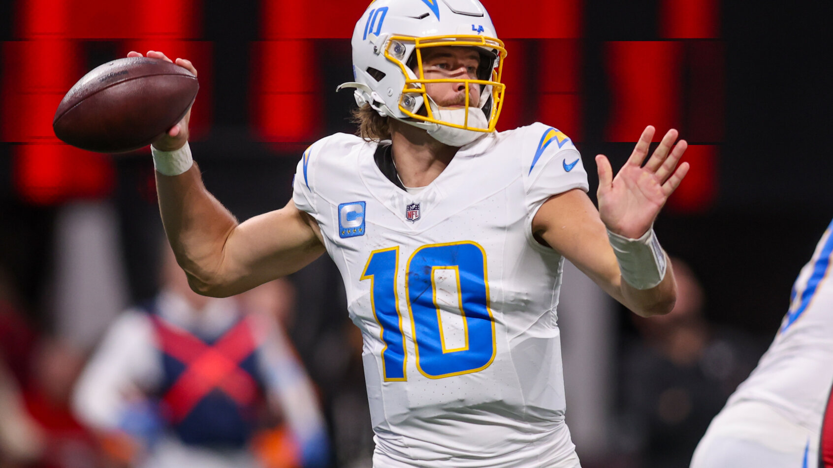 Los Angeles Chargers quarterback Justin Herbert throwing a pass