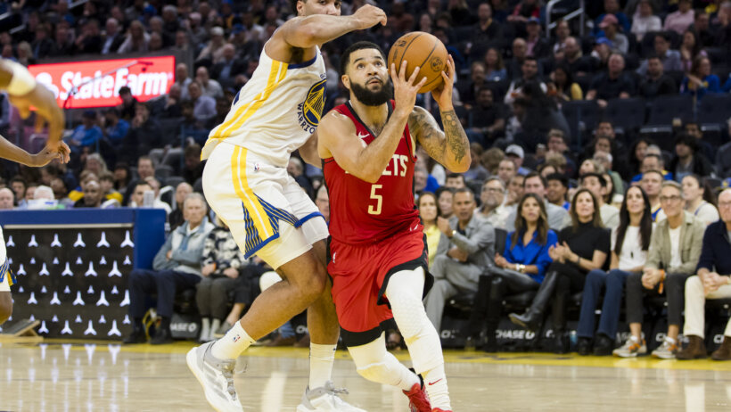 Houston Rockets guard Fred VanVleet drives to the basket against Golden State Warriors center Trayce Jackson-Davis