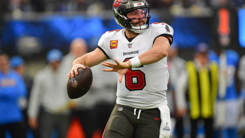 Tampa Bay Buccaneers quarterback Baker Mayfield moves out to pass