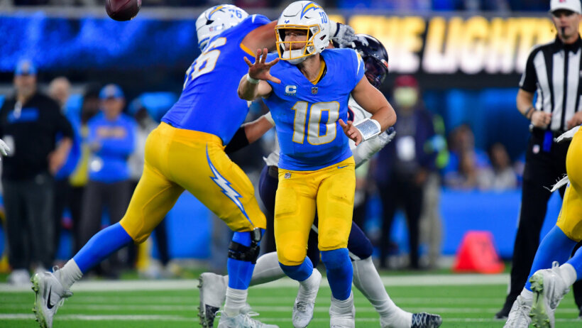 Los Angeles Chargers quarterback Justin Herbert throwing a pass