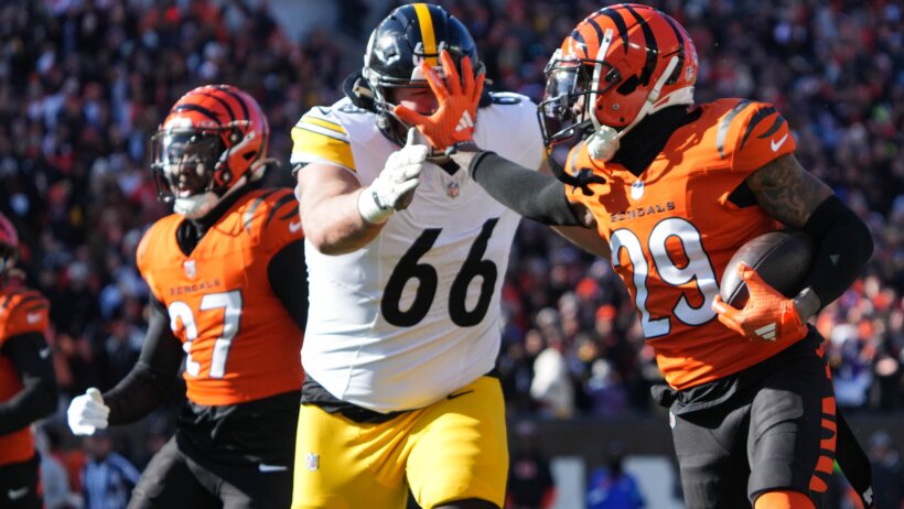 Bengals DB Cam Taylor-Britt running with the ball against the Pittsburgh Steelers