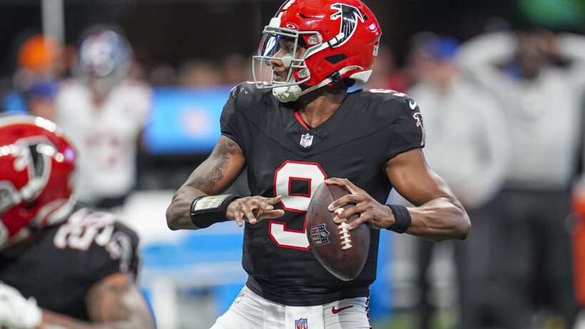Atlanta Falcons quarterback Michael Penix Jr. looks for a receiver