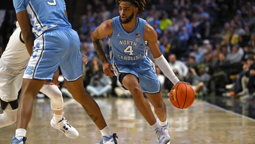 North Carolina Tar Heels guard R.J. Davis goes around a screen