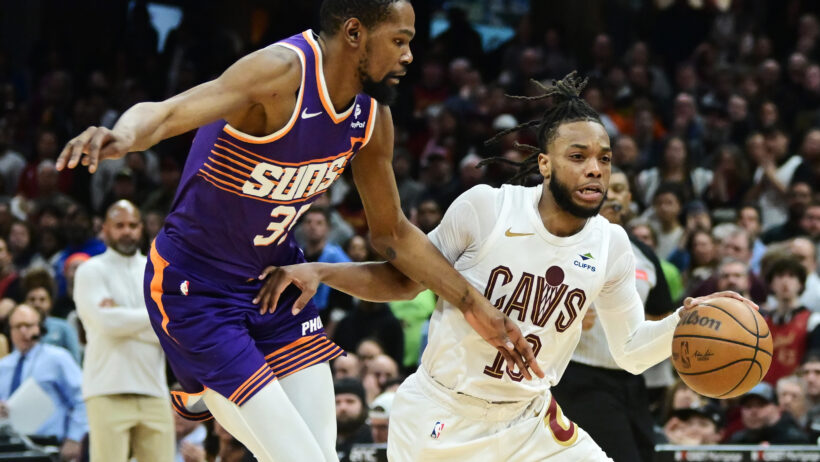 Cleveland Cavaliers guard Darius Garland driving past Phoenix Suns forward Kevin Durant