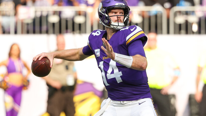 Minnesota Vikings quarterback Sam Darnold throws the ball against the Detroit Lions