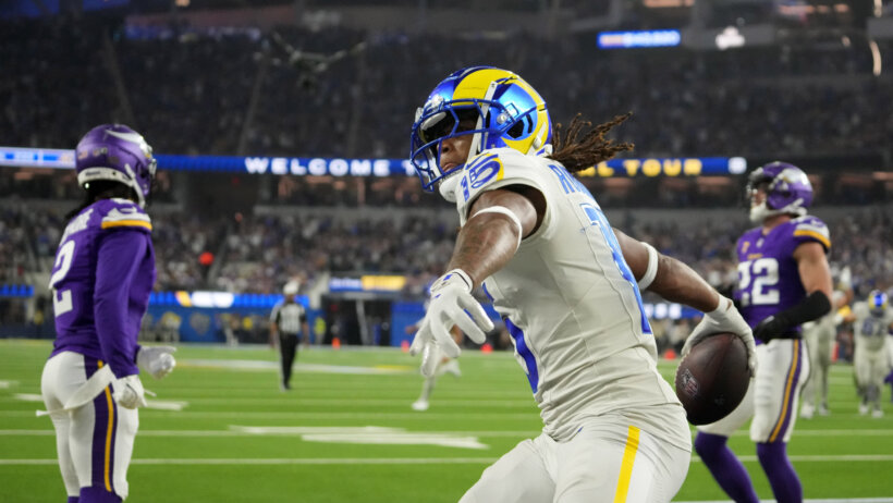Los Angeles Rams wide receiver Demarcus Robinson throwing the ball into the crowd after scoring a touchdown