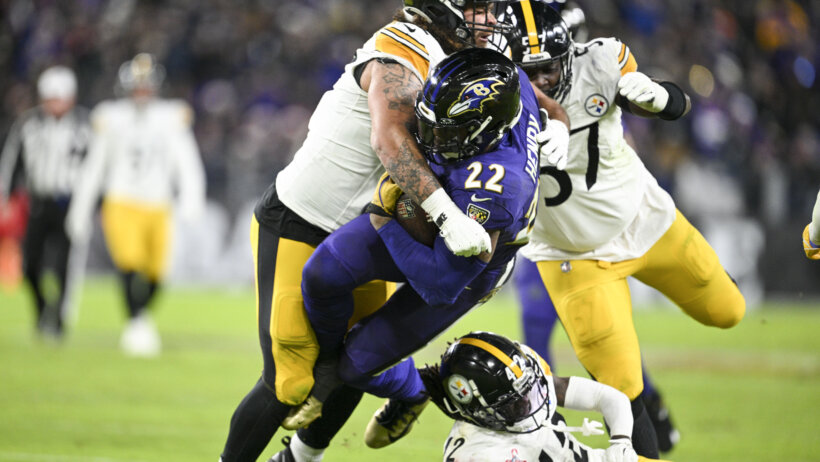 Pittsburgh Steelers defensive tackle Isaiahh Loudermilk tackling Baltimore Ravens running back Derrick Henry