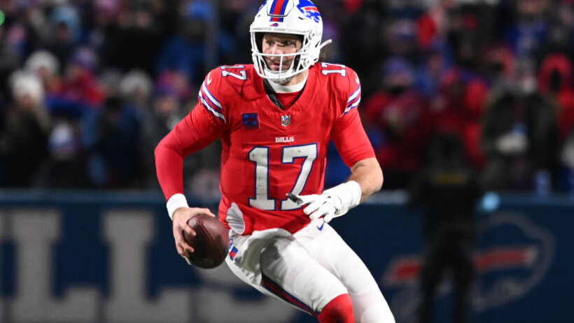 Josh Allen scrambles versus the Patriots.